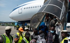 Nigerians being repatriated. Photo: AFP