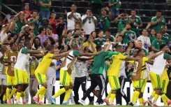 South African players celebrate the 1-0 victory in the 2026 World Cup Group A football match between South Africa and South Korea. AFP/Julio Cesar Aguilar