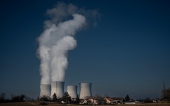 vapor rising from cooling towers of the Bugey nuclear power plant in Saint-Vulbas. AFP/Jean-Philippe Ksiazek
