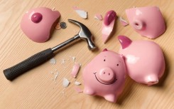 File: A smashed piggy bank. GettyImages/The Image Bank