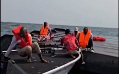 Passengers being rescued after a boat capsized on Zimbabwe’s Lake Kariba following an encounter with strong waves. AFP/UGC/Maxton Kanhema