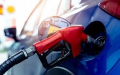 File: A car filling up at a petrol station. GettyImages/Fahroni