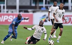 Asanele Bonani of Chippa United FC takes down Kamogelo Sebelebele of Orlando Pirates earning him a yellow card. Gerhard Duraan/Gallo Images
