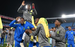 Themba Zwane of Mamelodi Sundowns FC is lifted by his teammates. Lefty Shivambu/Gallo Images