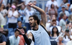 Spain's Carlos Alcaraz celebrates defeating USA's Tommy Paul in their men's singles round. AFP/Timothy A Clary