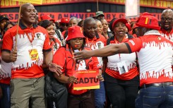 COSATU members celebrating during the day 2 of the COSATU 15th National Congress at Gallagher Convention Centre.  OJ Koloti/Gallo Images