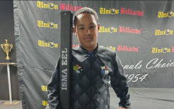 Isma-eel Gertson holding his pool cue case