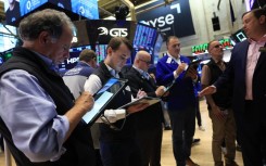 Traders work on the floor of the New York Stock Exchange (NYSE) in New York. AFP/Timothy A Clary