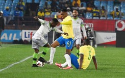 Ndabayithethwa Ndlondlo of Marumo Gallants, Aubrey Modiba of Mamelodi Sundowns FC and Kutlwano Letlhaku of Mamelodi Sundowns. Lefty Shivambu/Gallo Images