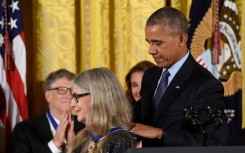 File: Former US President Barack Obama presents mathematician and computer scientist Margaret Hamilton with the Presidential Medal of Freedom. AFP/Saul Loeb