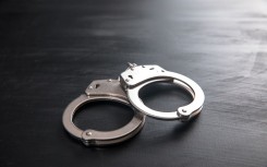 File: A pair of handcuffs. Getty Images/Daniel Tadevosyan