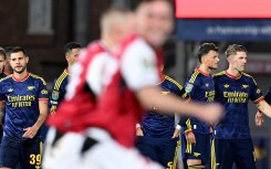 The Arsenal team after the Carabao Cup Fourth Round match between Fleetwood Town and Arsenal at Highbury Stadium. Stuart MacFarlane/Arsenal FC via Getty Images