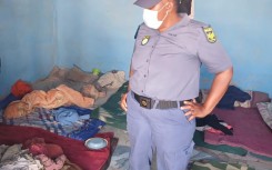 A police officer inside the illegal rehab centre in Mpumalanga. Supplied