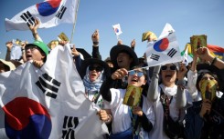 S. Korean pilgrims celebrate after the pope says Seoul will host the next World Youth Day