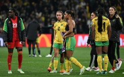 Jamaica players reacts after their Women's World Cup loss to Colombia