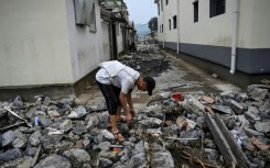 Scores have died in the floods across northern China