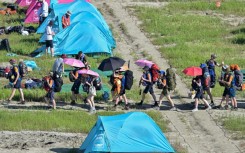 Tens of thousands of scouts were evacuated from their South Korean campsite ahead of a typhoon, just days after a heatwave caused mass illnesses