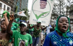 Supporters of Sierra Leone President Julius Maada Bio after his June election, whose results are questioned by the US ambassador