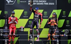 Brad Binder (right) on the Silverstone podium with Aleix Espargaro (centre) and Francesco Bagnaia 