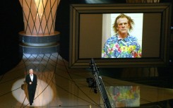 Steve Martin at the 75th Academy Awards in 2003 poking fun at actor Nick Nolte's mug shot