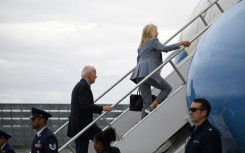 US President Joe Biden and First Lady Jill Biden board Air Force One in Reno, Nevada on August 21, 2023 as they depart for Hawaii