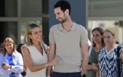 PSG goalkeeper Sergio Rico leaves hospital with his wife Alba Silva on Friday after suffering a serious head trauma in an accident 
