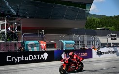 Francesco Bagnaia takes the chequered flag in Saturday's sprint at Spielberg 