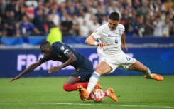 Greece defender Konstantinos Mavropanos (R) has joined West Ham from Stuttgart 
