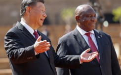 South African President Cyril Ramaphosa, right, with Chinese President Xi Jinping, who is combining a state visit with the BRICS summit