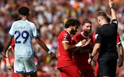Liverpool's Alexis Mac Allister (C) was sent off against Bournemouth