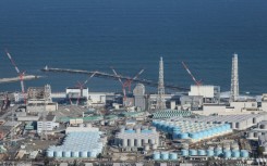 An aerial photo shows storage tanks that hold treated water at TEPCO's crippled Fukushima Daiichi Nuclear Power Plant