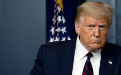 Former US president Donald Trump is to surrender at a Georgia jail to face racketeering charges