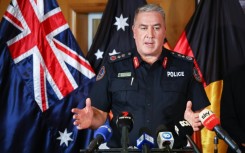 Northern Territory Police Commissioner Michael Murphy speaks to reporters about the crash of an Osprey aircraft during military exercises off northern Australia that killed three US Marines and left eight more in hospital