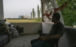 Yusuf, who watches the Afsin plant from his balcony, says pollution is harming local agriculture 