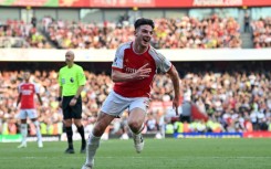 Declan Rice celebrates after scoring Arsenal's second goal against Manchester United