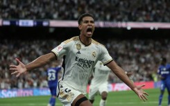 Jude Bellingham celebrates after scoring his fifth goal of the season to snatch Madrid a late win