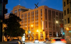 An X sign is seen on the roof of the headquarters of social media platform X, formerly known as Twitter