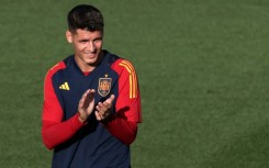 Alvaro Morata read out a statement on behalf of the entire team congratulating their female counterparts on "a historic" achievement