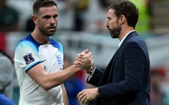 England manager Gareth Southgate (right) will not be deterred from playing Jordan Henderson (left)