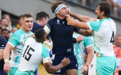 South Africa lock Eben Etzebeth (right) grapples with Scotland's flanker and captain Jamie Ritchie during their World Cup opener