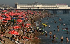 High September temperatures have seen Britons flock to beaches such as Brighton in southern England