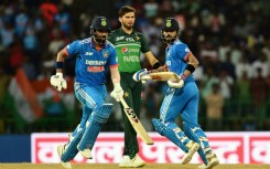 Virat Kohli (right) and KL Rahul hit 122 and 111 respectively in an unbeaten stand of 233 against Pakistan