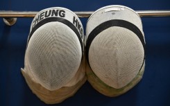 Masks used by members of the Hong Kong fencing team are seen during a media event in the city