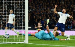 Harry Maguire (right) scored an own goal in England's 3-1 friendly win over Scotland 