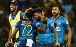 Sri Lanka's Charith Asalanka (2nd L) Kusal Mendis (2nd R) celebrate sri Lanka's two wicket win 