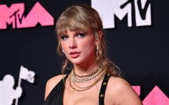 Taylor Swift is releasing a concert documentary of her massively popular "Eras Tour" that is poised for a record-breaking opening weekend