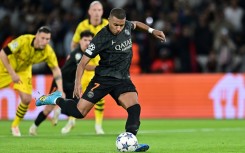 Kylian Mbappe's penalty put Paris Saint-Germain on the way to victory against Borussia Dortmund on Tuesday