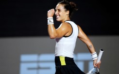 Italy's Martina Trevisan reacts on her way to an upset victory over top seed Ons Jabeur