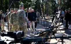 US Secretary of State Antony Blinken, an advocate for providing military aid to Ukraine, looks at weapons while he tours a Ukraine supply site near Kyiv on September 7, 2023