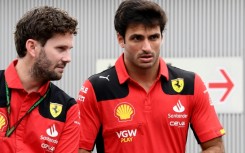 Ferrari's Spanish driver Carlos Sainz prepares for the Formula One Japanese Grand Prix race in Suzuka after winning in Singapore last week